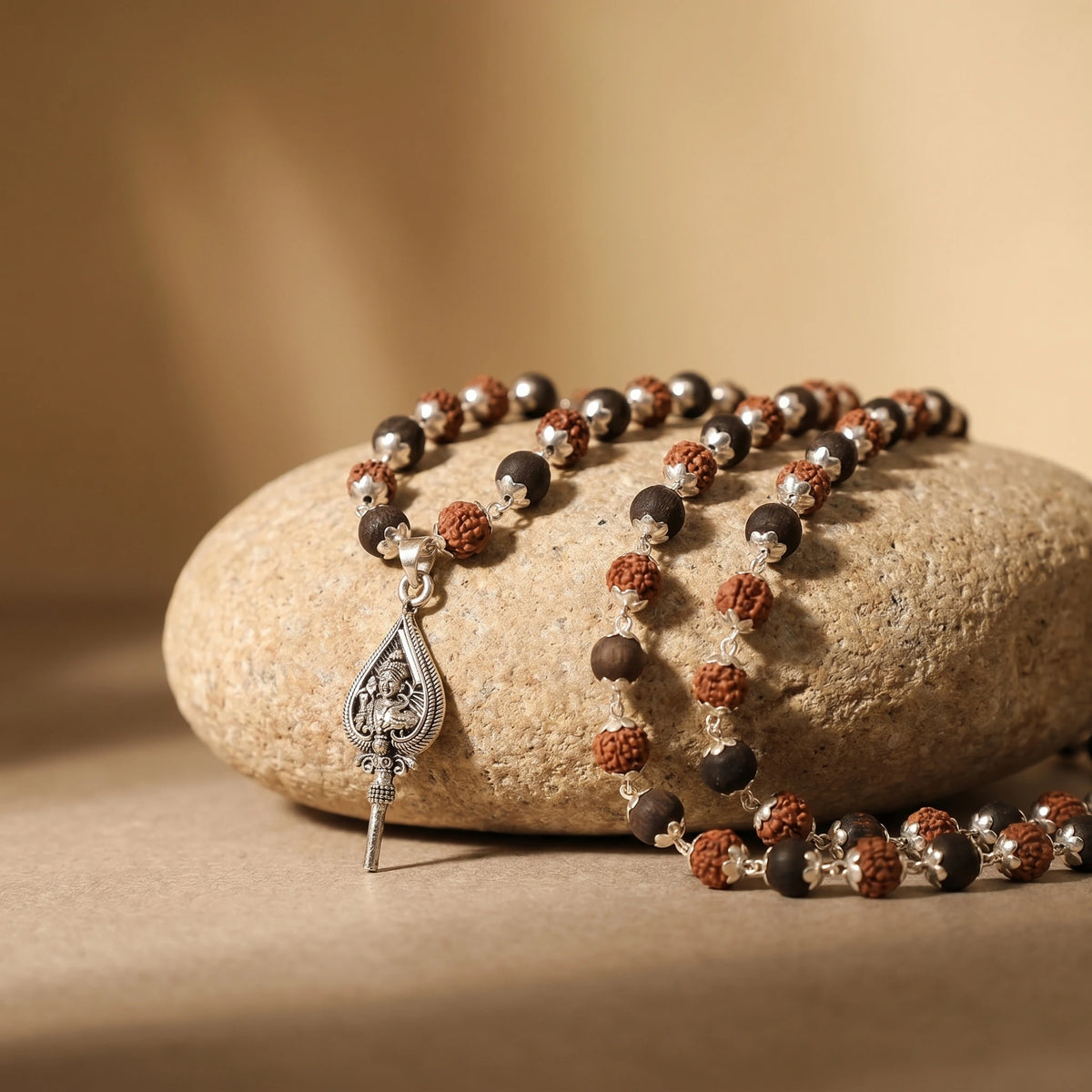 Rudraksha Karungali Malai in Silver-Cap with Lord Murugan Shastra Pendant