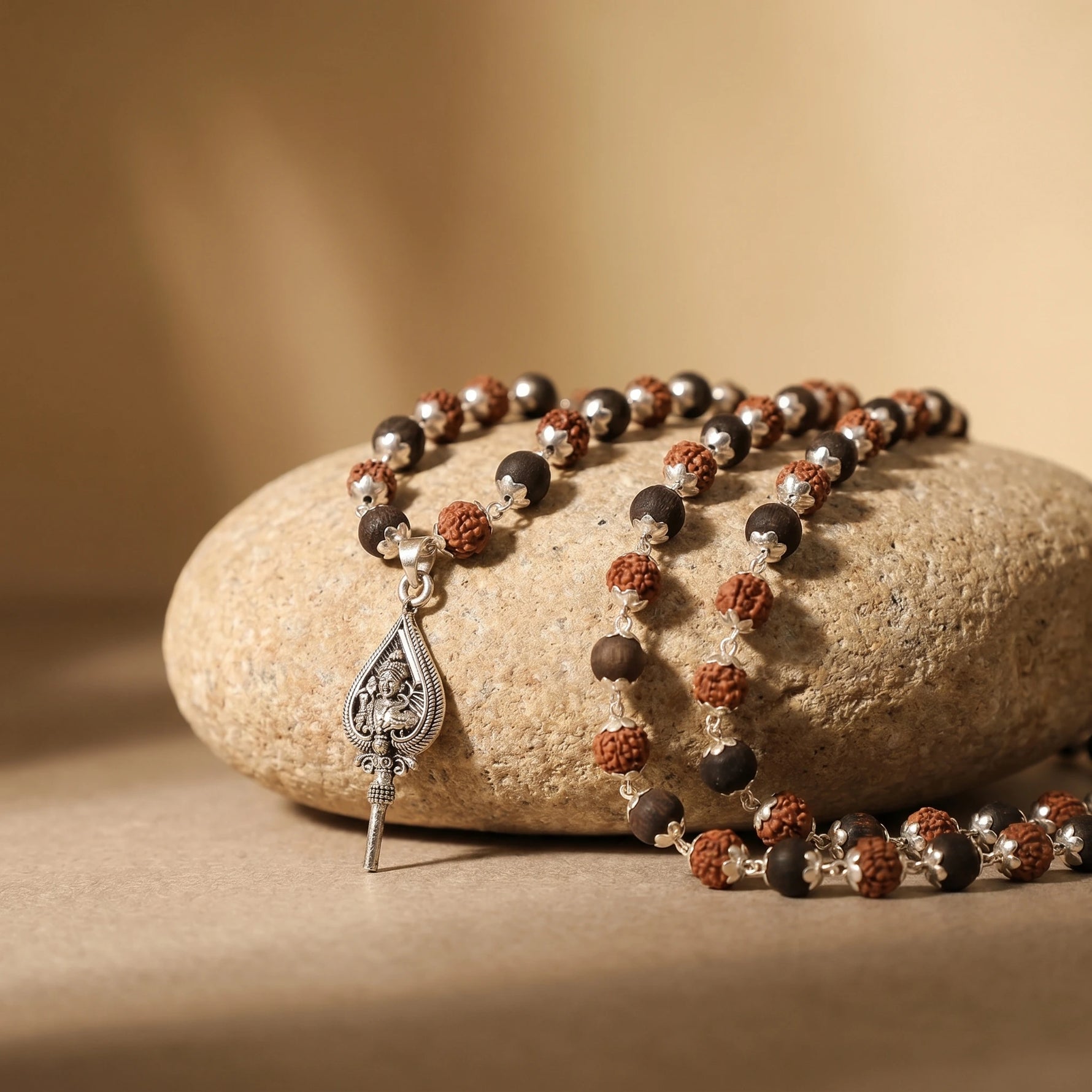 Rudraksha Karungali Malai in Silver-Cap with Lord Murugan Shastra Pendant